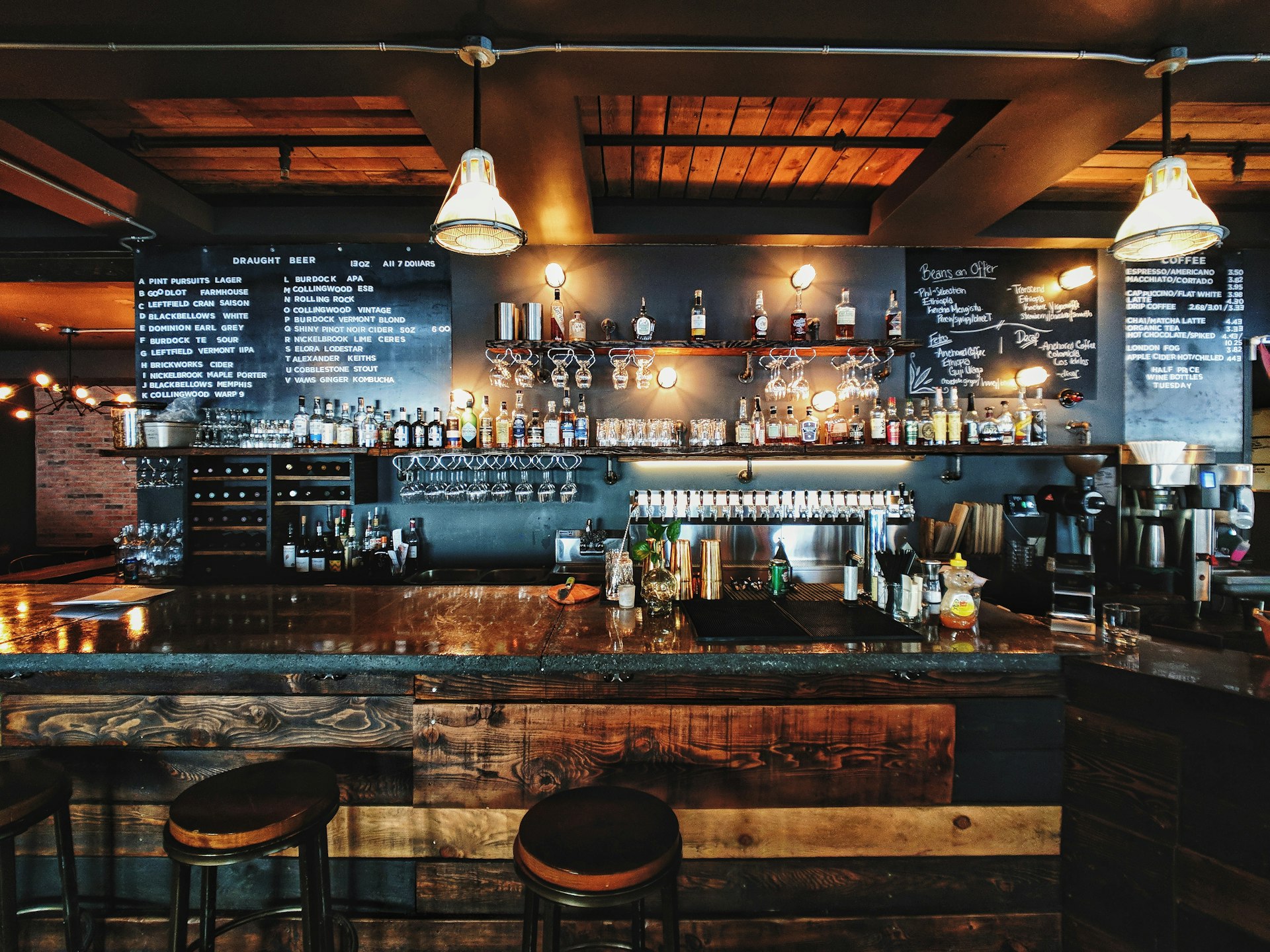 Bar with digital menu displays and sports screens